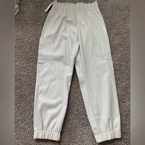 mustard seed boutique cream faux leather joggers